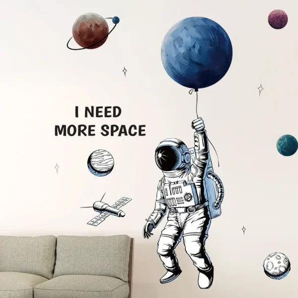 Decorazione murale con astronauta e pianeti, ideale per ambienti scientifici e educativi.