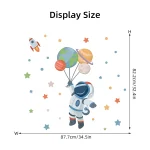 Decorazione spaziale con astronauta e pianeti, ideale per ambienti scientifici e educativi, perfetta come oggetto decorativo per appassionati di astronomia e scienza.