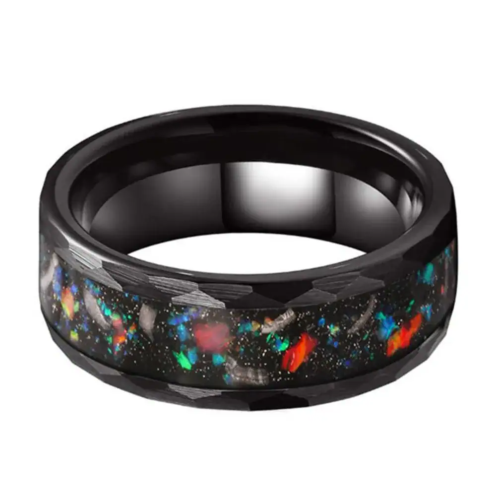 Anello in resina con effetto galassia, decorato con colori vivaci e glitter che ricordano un cielo stellato, perfetto come accessorio originale e cosmico.