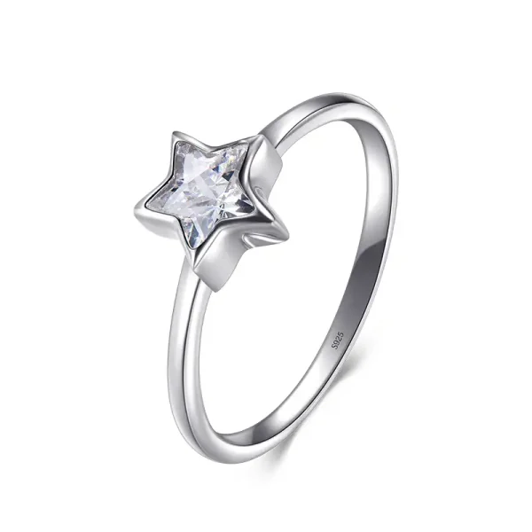 Anello con stella e pietra brillante, design elegante e raffinato, perfetto come regalo o per occasioni speciali.