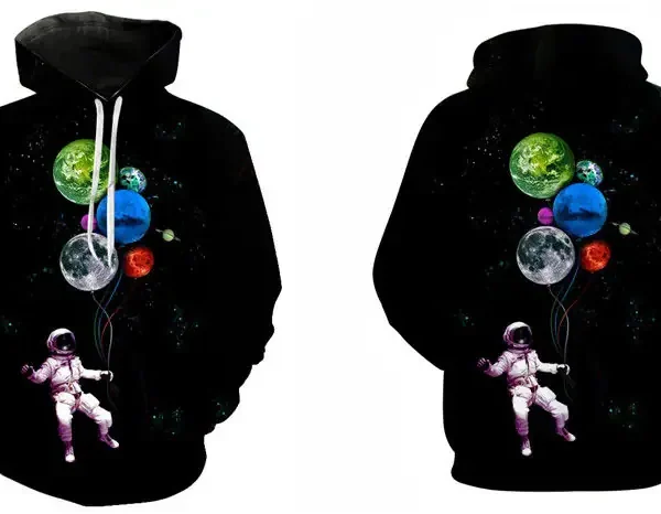 Vestito con stampa di astronauta e pianeti nello spazio, ideale per appassionati di scienza e astronomia.