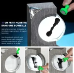Piantina di un mostro in bottiglia con effetto magnetico e movimento.