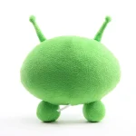 Pupazzo decorativo a forma di alieno verde con grandi occhi e antenne, ideale come oggetto decorativo scientifico o da collezione.