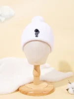 Cappello invernale con stampa di astronauta, ideale per bambini e appassionati di spazio.