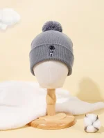 Berretto invernale grigio con pompon, ideale per appassionati di scienza e decorazioni a tema scientifico, perfetto per l'uso quotidiano o come oggetto decorativo.