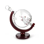 Globo terraqueo decorativo in vetro con nave spaziale, perfetto come oggetto scientifico e decorativo per appassionati di astronomia e scienza.