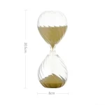 Timer da cucina in vetro con sabbia colorata, decorazione scientifica elegante.
