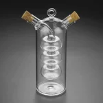 Vaso di vetro con bolle e tappi in sughero, oggetto decorativo scientifico, perfetto per appassionati di chimica e decorazioni a tema scientifico.