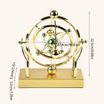 Vassoio decorativo a forma di modello atomico dorato, perfetto come oggetto di arredamento scientifico o da scrivania, con dimensioni di circa 22,9 cm di larghezza e 22,5 cm di altezza.