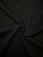 Tessuto nero in tessuto morbido, ideale per creazioni artistiche e decorazioni scientifiche, con una texture liscia e resistente, perfetta per progetti di alta qualità.