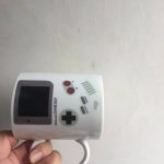 Portatile Nintendo Game Boy decorativa, oggetto scientifico e vintage.