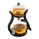 Set teiera e vassoio scientifico in vetro e legno, perfetto come decorazione o oggetto da collezione, con design ispirato a strumenti di laboratorio.