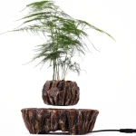 Pianta artificiale in vaso di pietra naturale, decorazione moderna e elegante per ambienti interni ed esterni.