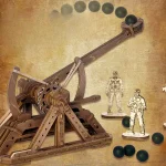 Modello di gioco scientifico in legno con palla nera e meccanismo di lancio, decorato con figure di soldati, ideale come decorazione educativa e decorativa.