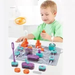 Giocattolo educativo con circuiti elettrici per bambini, stimola l'apprendimento scientifico e la creatività attraverso un set di oggetti colorati e interattivi.