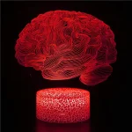 Rappresentazione artistica di una mente umana in stile 3D con linee rosse luminose su sfondo nero, simbolo di creatività e pensiero.