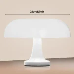 Lampada decorativa in vetro opalino con design moderno e minimalista, perfetta come oggetto di arredamento scientifico o decorativo.