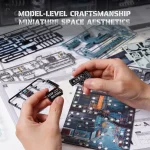 Mani che assemblano un modello di circuito elettronico con parti di plastica e componenti, ideale come decorazione scientifica o progetto di modellismo.