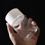 Vaso di laboratorio trasparente con tappo bianco, ideale per esperimenti scientifici e decorazioni a tema scientifico.