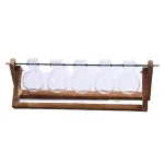 Set di cinque beute di vetro trasparente su supporto in legno, perfette per esperimenti scientifici e decorazioni a tema scientifico.