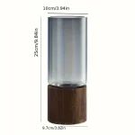Vaso in vetro trasparente con base in legno, perfetto per decorazioni scientifiche e oggetti da collezione.