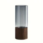 Vaso scientifico in vetro trasparente con base in legno, perfetto come decorazione o oggetto da collezione scientifica. Design elegante e minimalista.
