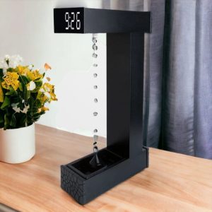 Orologio a cascata di gocce d'acqua con display digitale, perfetto come decorazione scientifica innovativa e funzionale. Ideale per ambienti di studio o ufficio, unisce estetica e tecnologia.